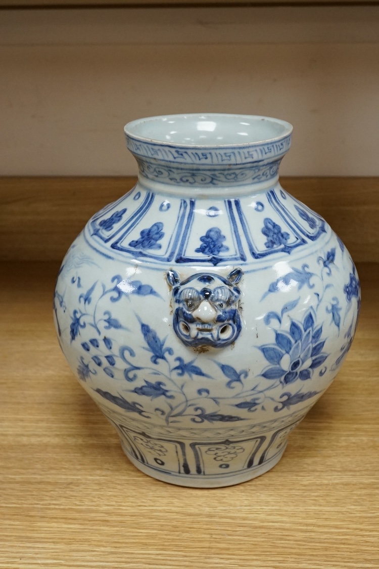 A Chinese blue and white bulbous jar hand painted with animals, 28cm high